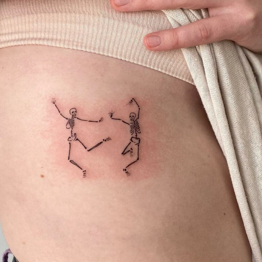 11+ Common Tattoo Ideas That Will Blow Your Mind! 14 Tiny Dancing Skeleton Tattoo