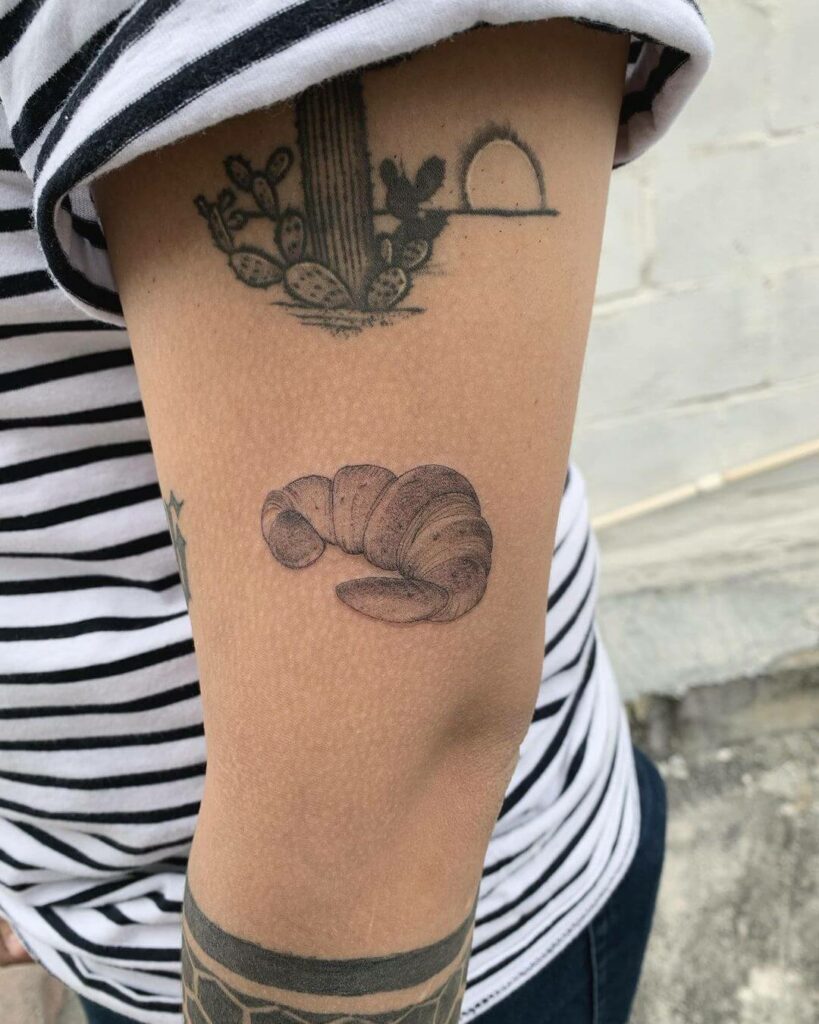 11+ Croissant Tattoo Ideas That Will Blow Your Mind! 13 Toaster Croissant Tattoo For Upper Arm