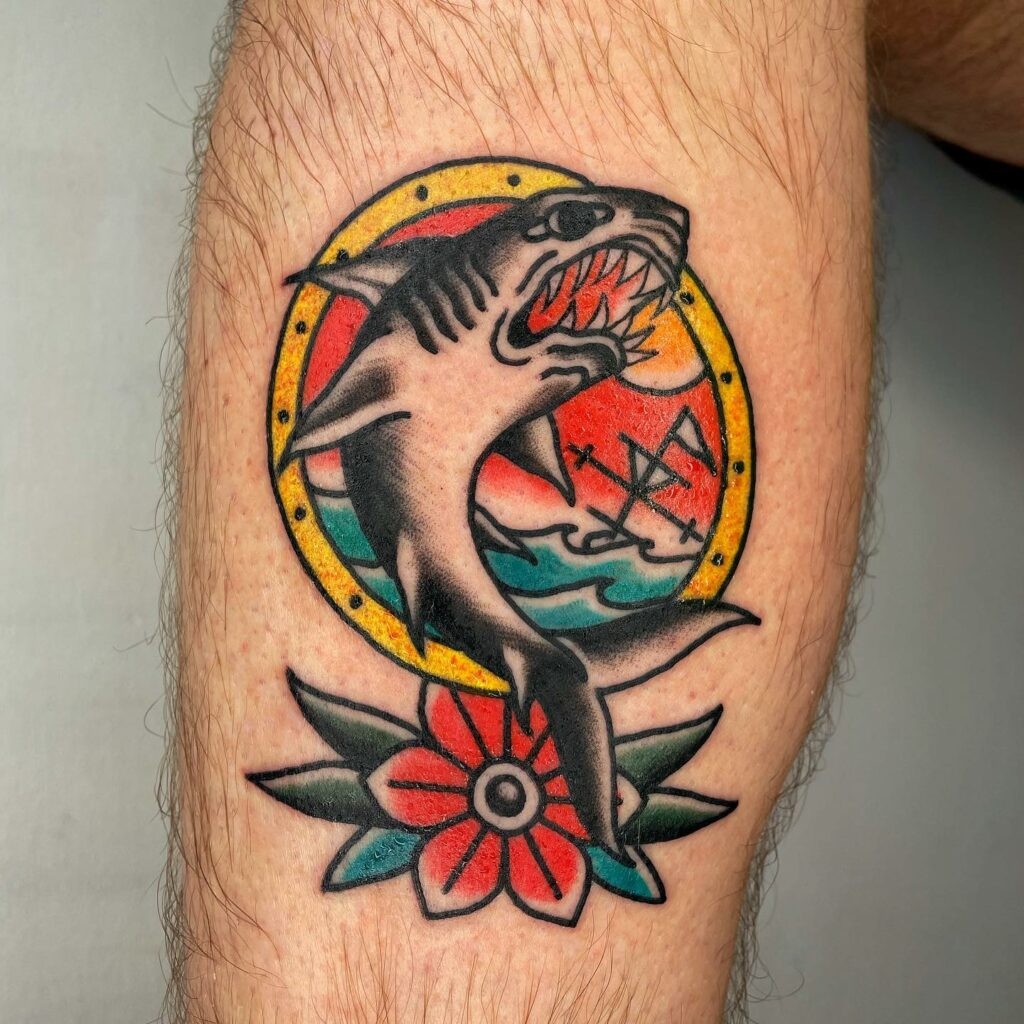 11+ Classic Americana Tattoo Ideas That Will Blow Your Mind! 13 Traditional American Shark Tattoo With A Flower Tattoo Design