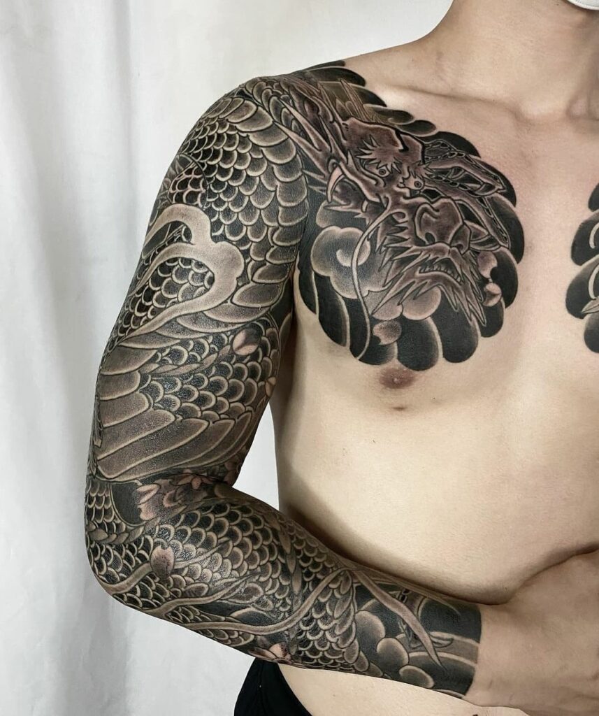 11+ Dragon Sleeve Tattoo Ideas You'll Have to See to Believe! 12 Traditional Black And Grey Japanese Dragon Tattoo Sleeve Design