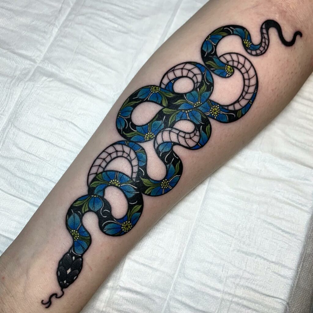 12+ Snake Thigh Tattoo Ideas To Inspire You! 12 Traditional Black Ink Snake Tattoos