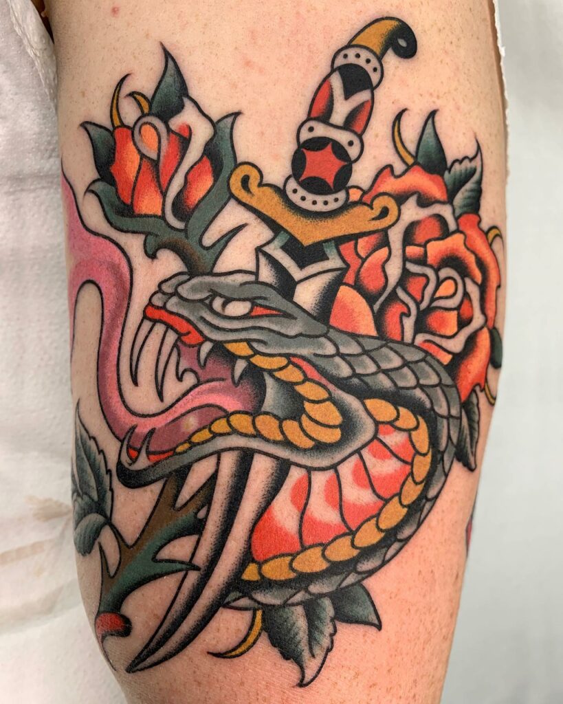 11+ Classic Americana Tattoo Ideas That Will Blow Your Mind! 12 Traditional Snake Tattoo With Traditional Dagger Tattoo