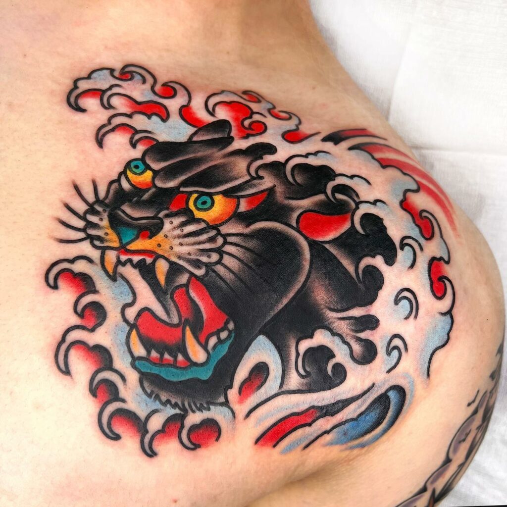 10+ Traditional Panther Head Tattoo That Will Blow Your Mind! 15 Traditional Tattoo Panther Head Tattoo With Wave