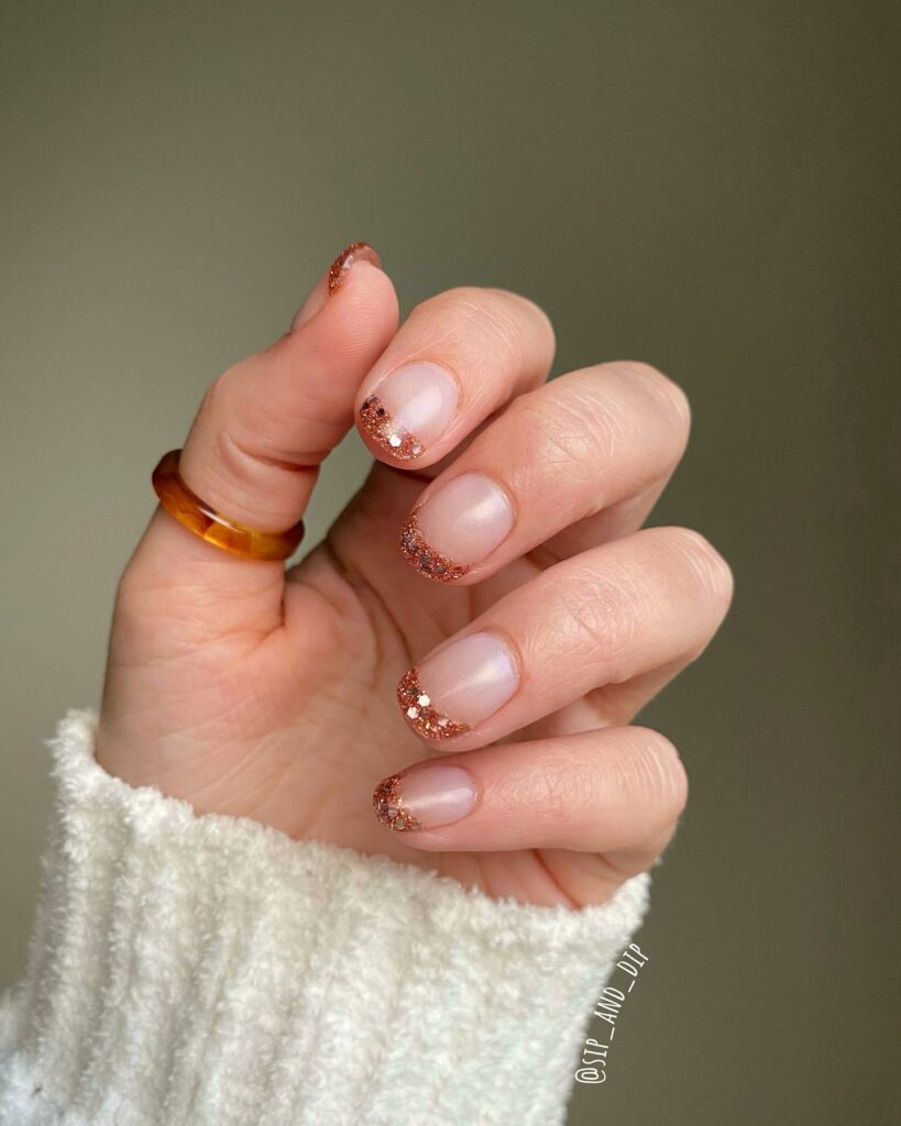Celebrate with 33 Short Christmas Nail Ideas in 2024 12 Gold French Short Christmas Nails