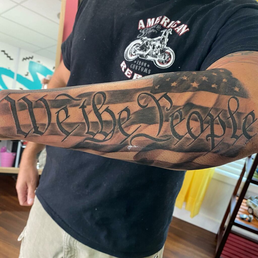 11+ Forearm American Flag Tattoo Ideas That Will Blow Your Mind! 15 We The People American Flag Tattoos