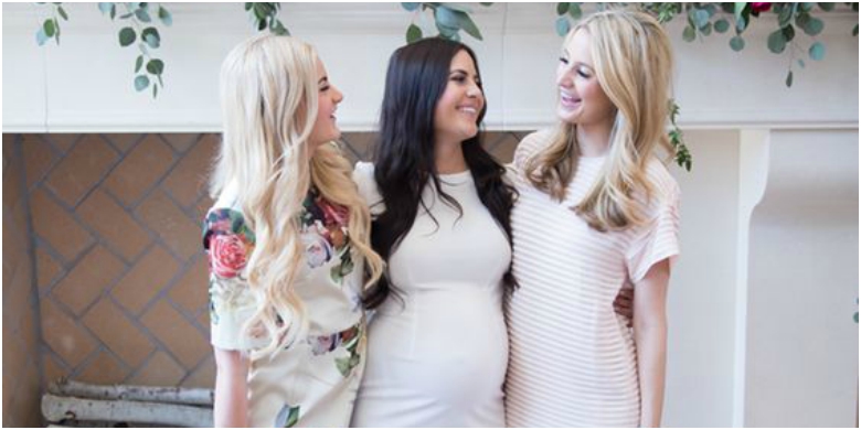 What to Wear to a Baby Shower 18 Three women in neutral coloured dresses in baby shower setting