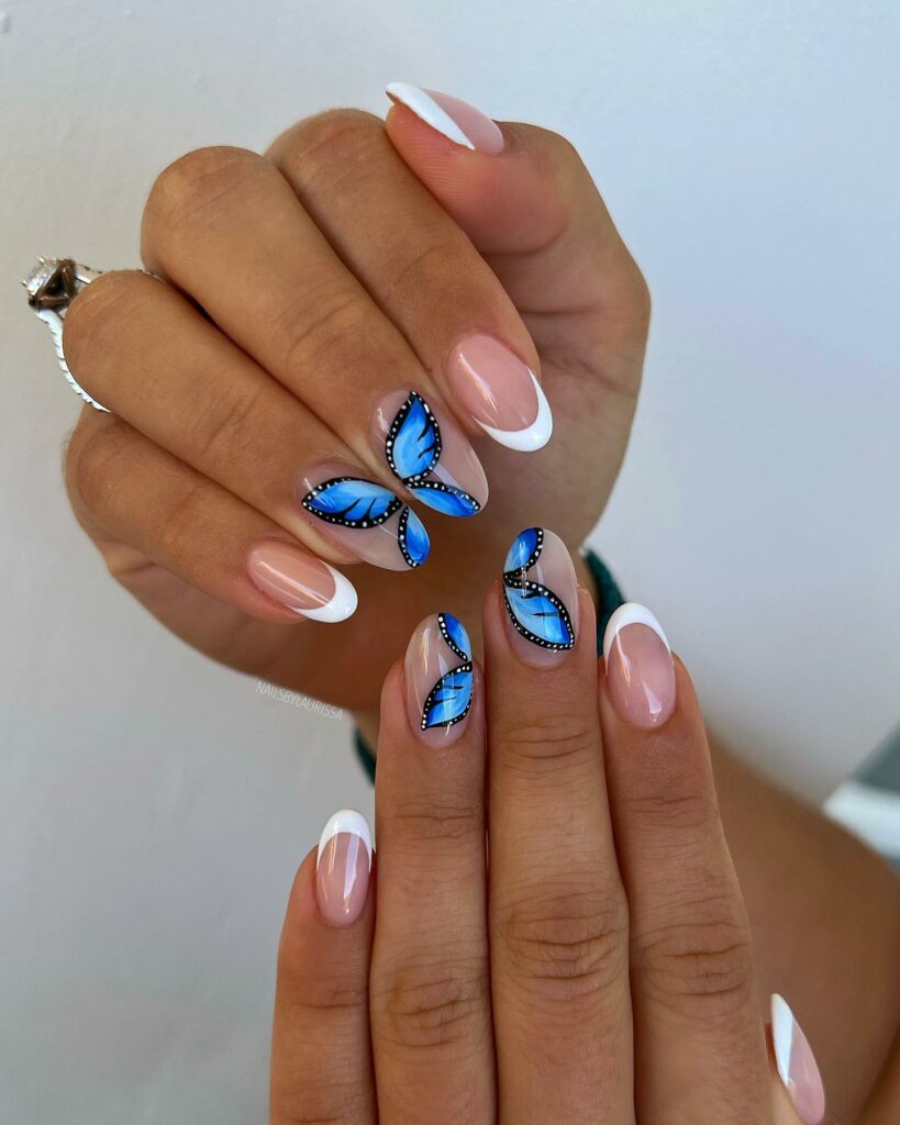 30 Latest Round Nail Designs To Try In 2024! 11 Whimsical Butterfly Art for Charismatic Round Nails