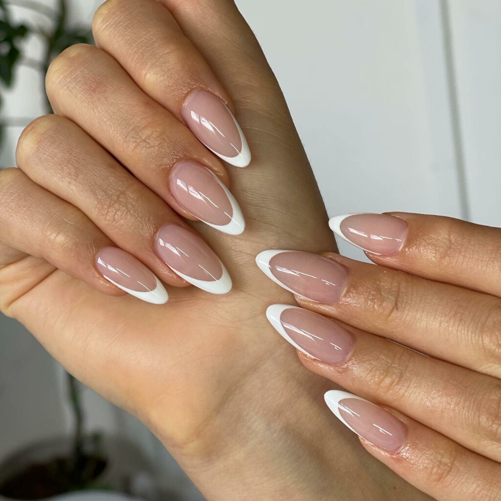 Rock 25 Chic White Almond Nail Designs in 2024 10 White Almond Nails with a French Twist