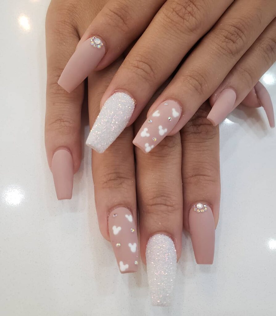 Immerse in Magic with 33 Disney Christmas Nail Ideas in 2024 21 White Glitter Mickey Mouse Nails
