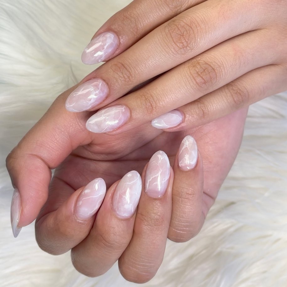 Rock 25 Chic White Almond Nail Designs in 2024 27 White Marble Almond Nails