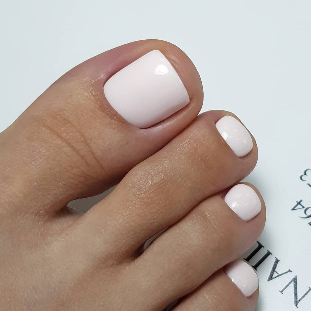 21 Latest Nude Pedicure Designs To Try In 2024! 16 White Nude Pedicure
