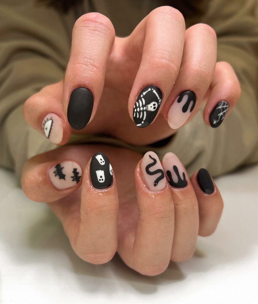 Get Spooky with 33 Black Halloween Nails To Try in 2024 23 White Occult Symbols