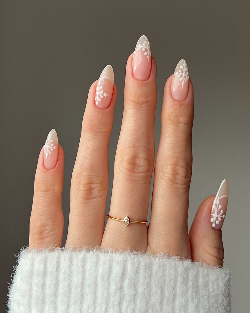 Feel Festive with 30 Christmas Almond Nail Ideas in 2024 13 White Snowflakes on Christmas Almond Nails