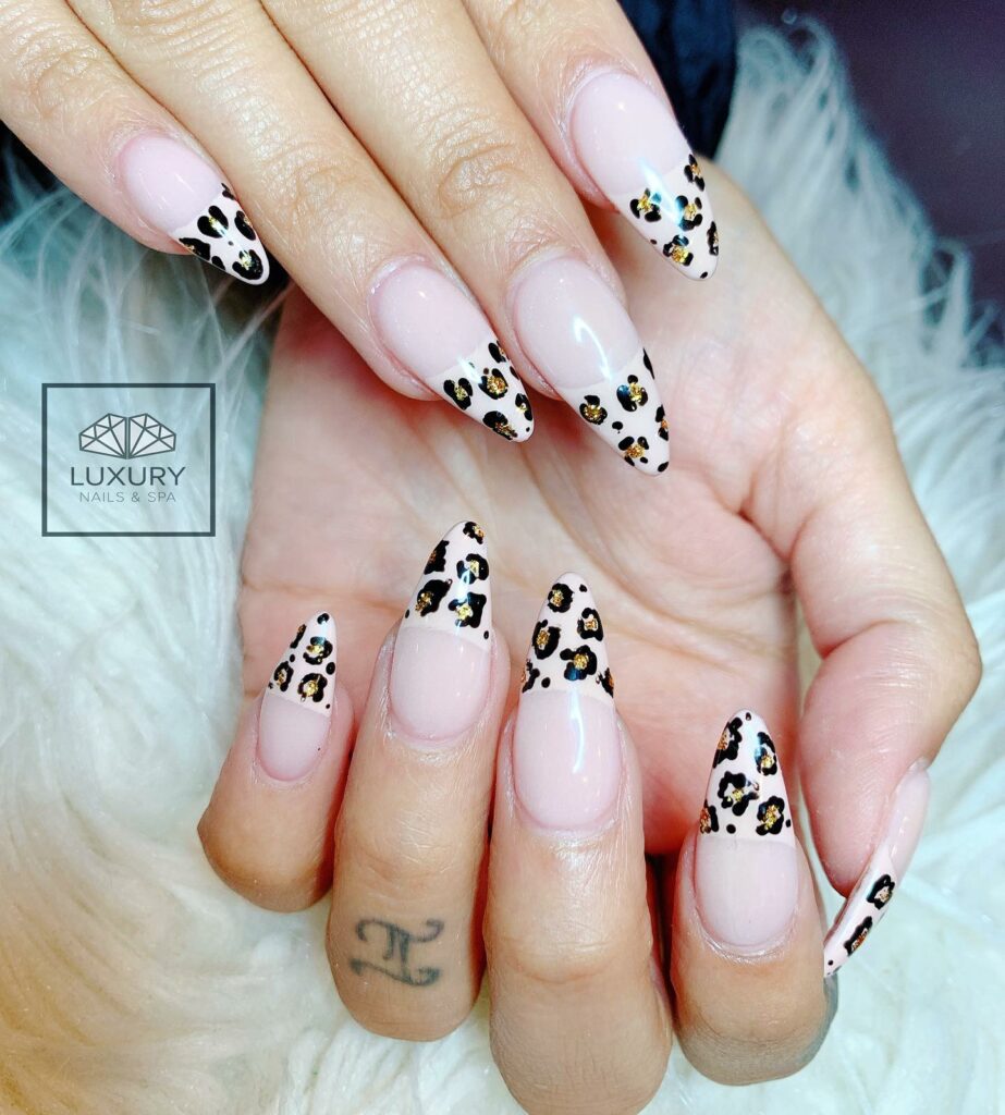 Experiment with 40 Fresh White Tip Nail Ideas for 2024 34 White Tips with Leopard Print