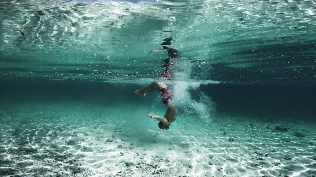 Do You Tan Faster In Water or Laying Out - Get The Facts In 2024 13 Why the Deep Dive The Appeal of Underwater Tanning