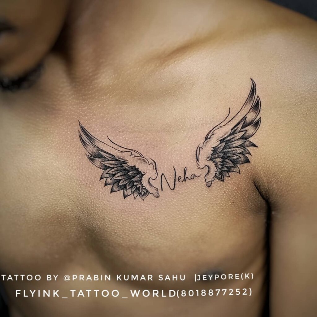 11+ Wings On Chest Tattoo Ideas That You Have To See To Believe! 16 Wings With Name On Chest Tattoos