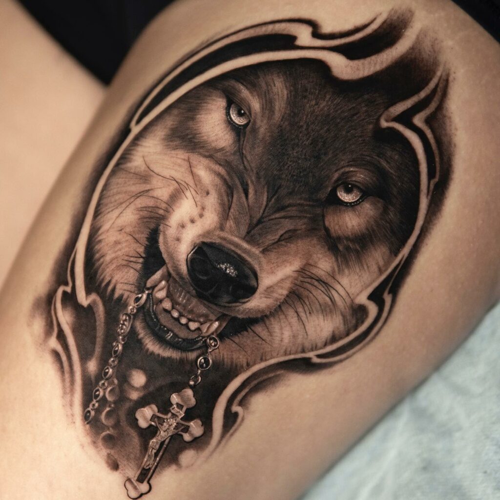 12+ Hand Rosary Tattoo Ideas To Inspire You 16 Wolf Biting A Traditional Rosary Bead Tattoos