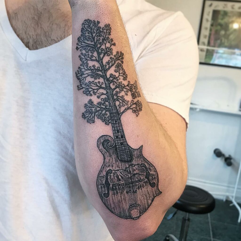 10+ Mandolin Tattoo Ideas That Will Blow Your Mind! 13 World In Mandolin Tattoo