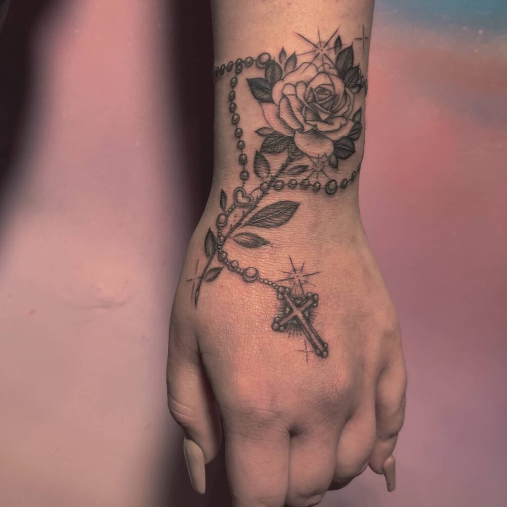 12+ Hand Rosary Tattoo Ideas To Inspire You 19 Wrist Rosary Tattoo On Hand With Rose