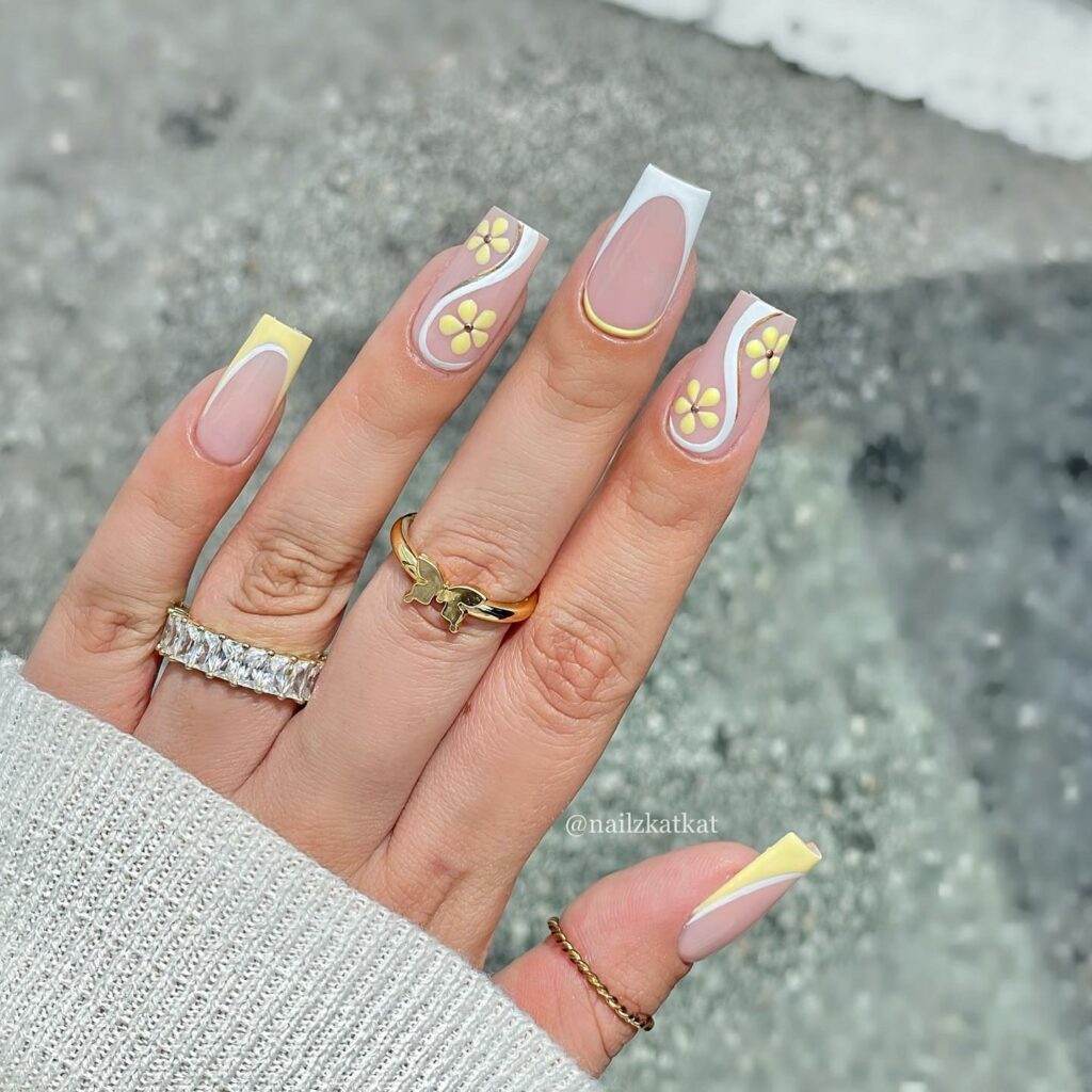 2024's Latest Flower Nail Designs: 29 Designs to Try 18 Yellow Limoncello flower nails