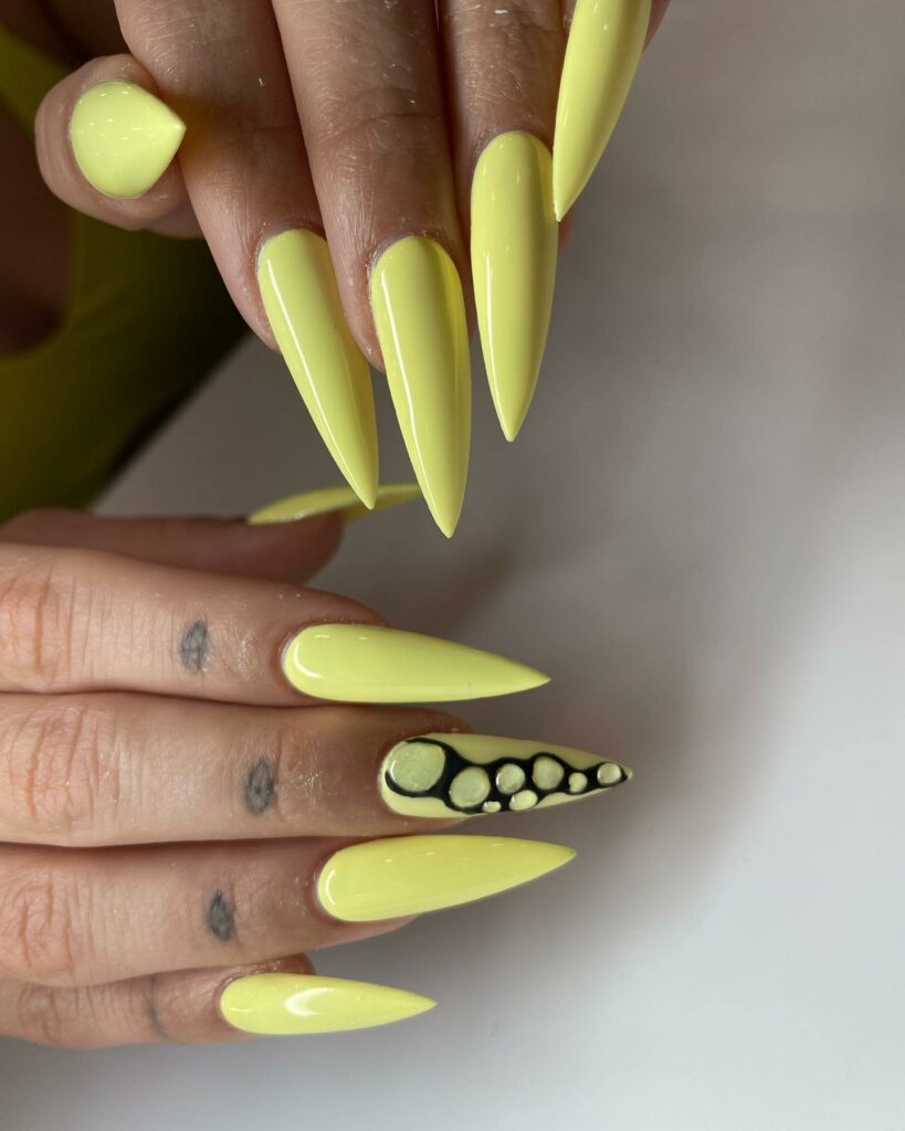 Check Out 24 Gorgeous Pretty Nail Designs for 2024 27 Yellow Matte Stiletto nails