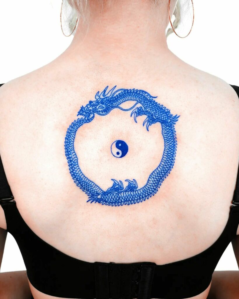 11+ Women's Feminine Dragon Tattoo Ideas That Will Blow Your Mind! 18 Yin Yang Blue Dragon Tattoos For Women