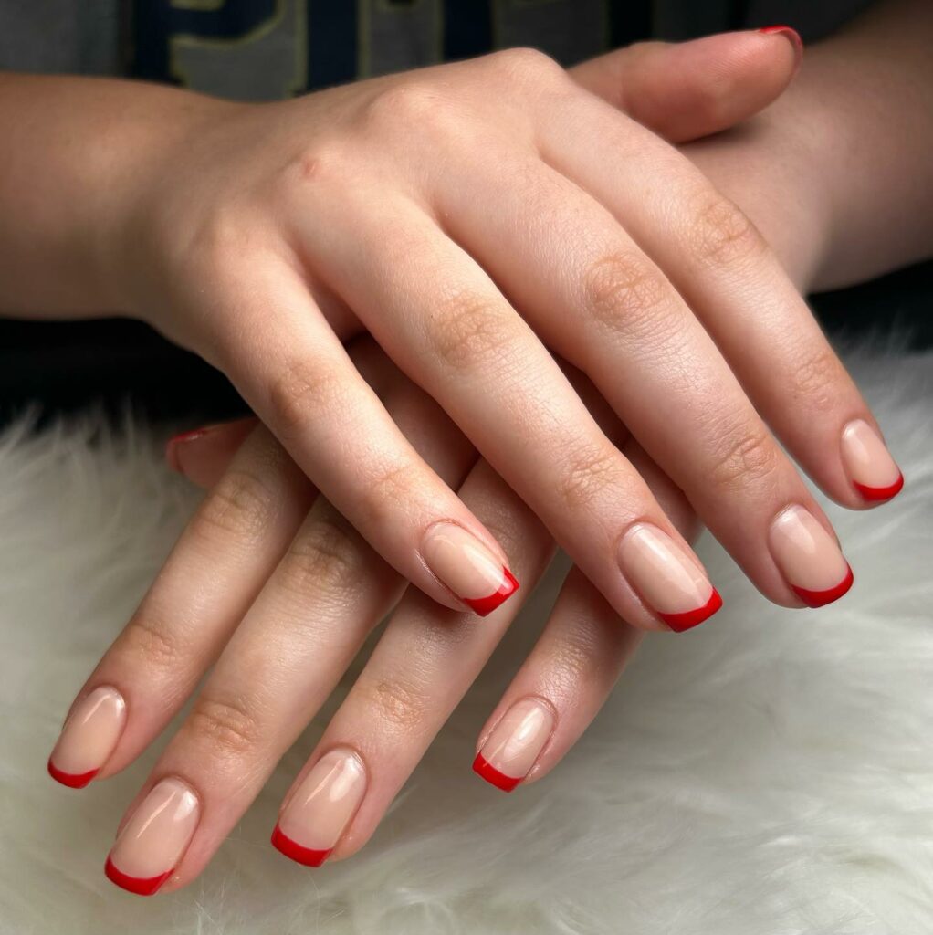 Explore 40 Red French Tip Nail Designs for 2024 20 half-Red, Half-Gold