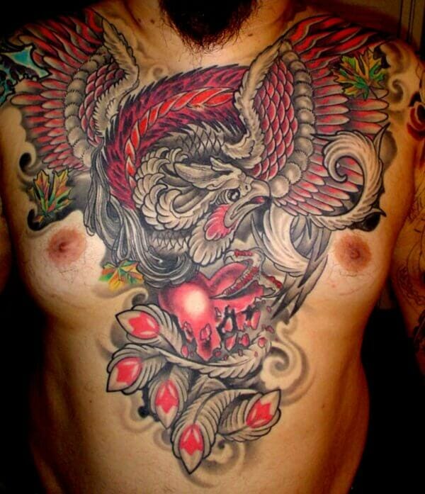 33 Latest Phoenix Tattoos To Inspire You In 2024! 38 Colourful Traditional Phoenix Chest Tattoo