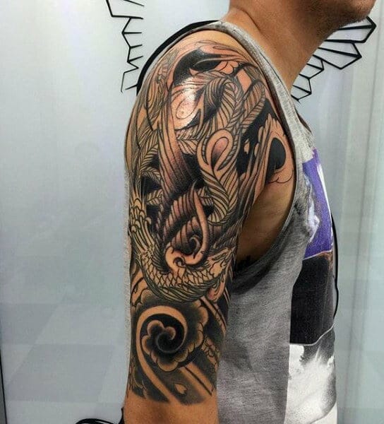 33 Latest Phoenix Tattoos To Inspire You In 2024! 24 Black Half Sleeve Phoenix Tattoo