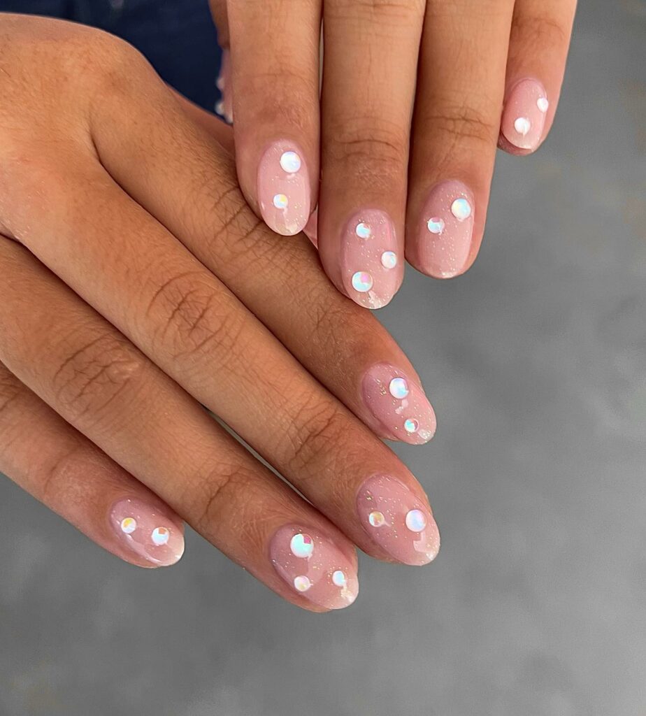 40 Latest Nude Pink Nail Ideas To Try In 2024! 37 The Allure of Gems on Nude Pink Nails