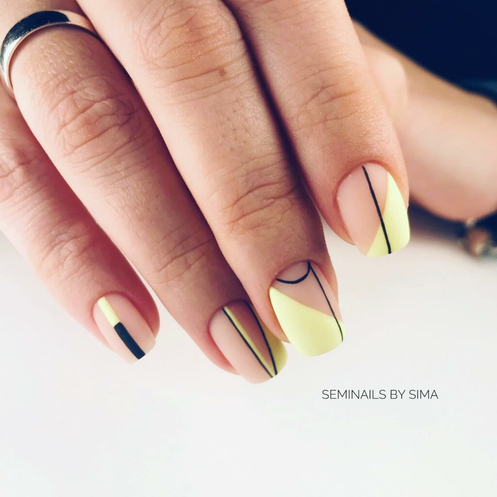 30 Latest Geometric Designs to Try In 2024! 15 Blend of Yellow and Black with Intricate Details