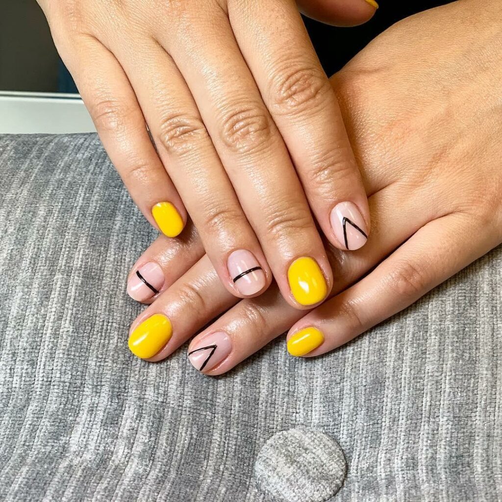 30 Latest Geometric Designs to Try In 2024! 33 Yellow and Black Abstract Nails