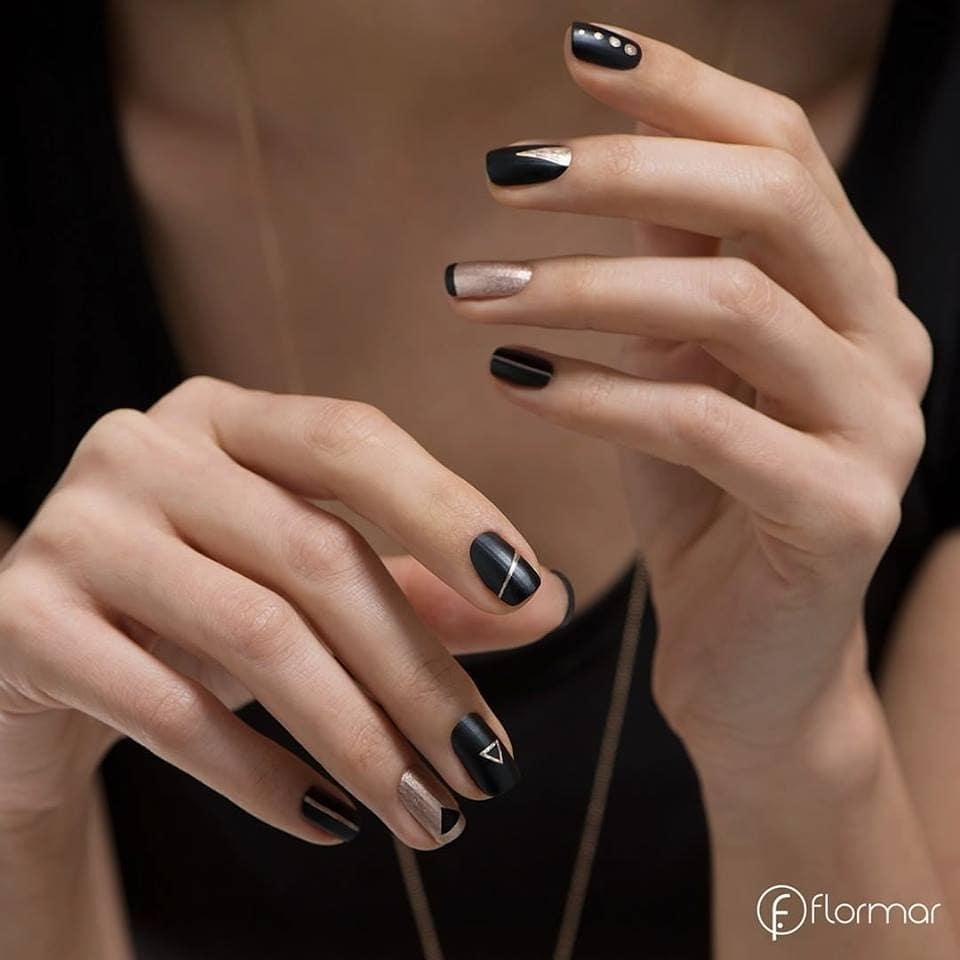 30 Latest Geometric Designs to Try In 2024! 35 Golden Luxury: Chic Golden and Black Nails