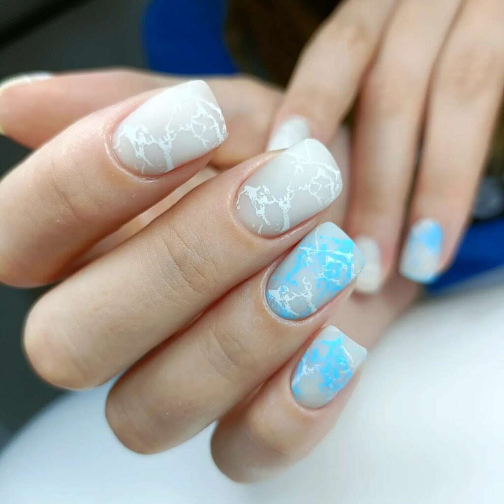 Indulge in 40 Marble Nail Designs for 2024 10 pastel blue tones marble nails