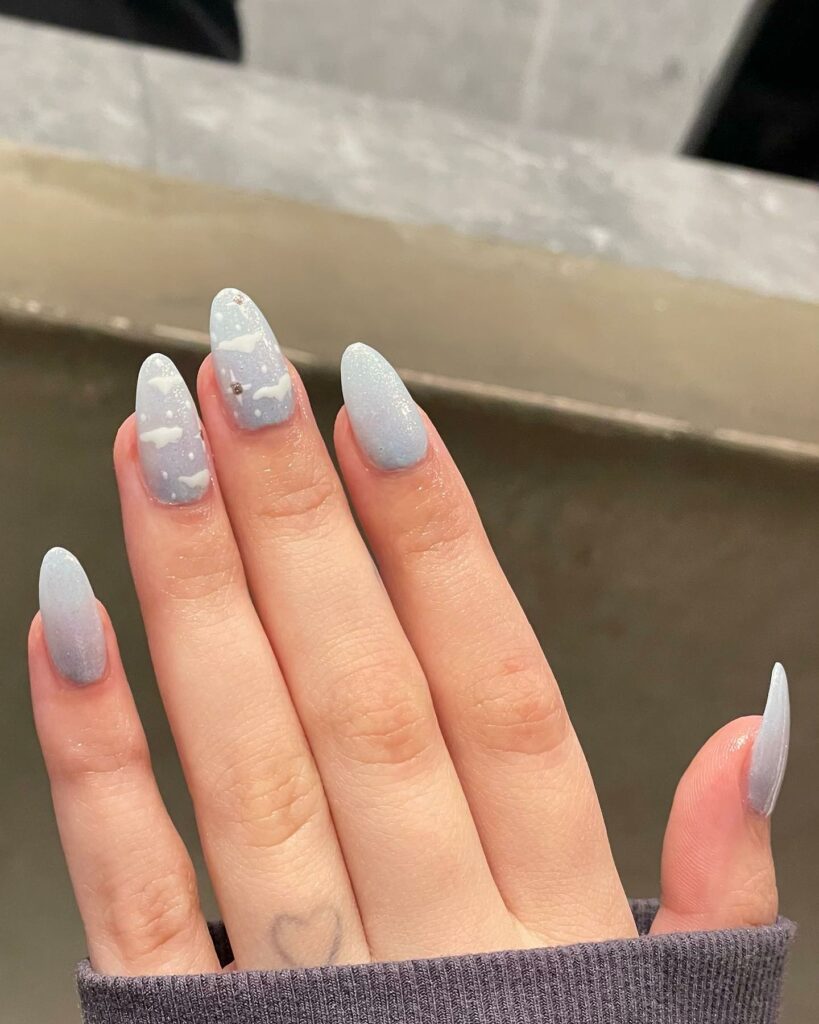18 Latest Light Blue Nail Designs To Try In 2024! 15 snakeskin baby blue nails