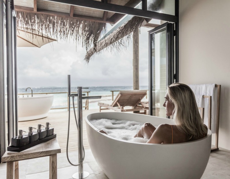 FushiFaru: The Maldives latest luxury resort, a small island making a BIG impact! 26 Fushi faru water villa bath overlooking the ocean