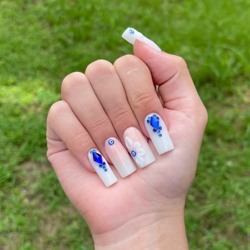 Channel Mystique with 20 Evil-Eye Nail Designs for 2024 24 white evil eye nails