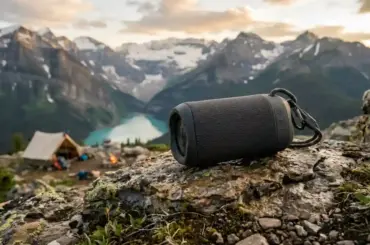 Bose SoundLink Flex portable Bluetooth speaker placed outdoors during an adventure with a rugged design and premium audio features